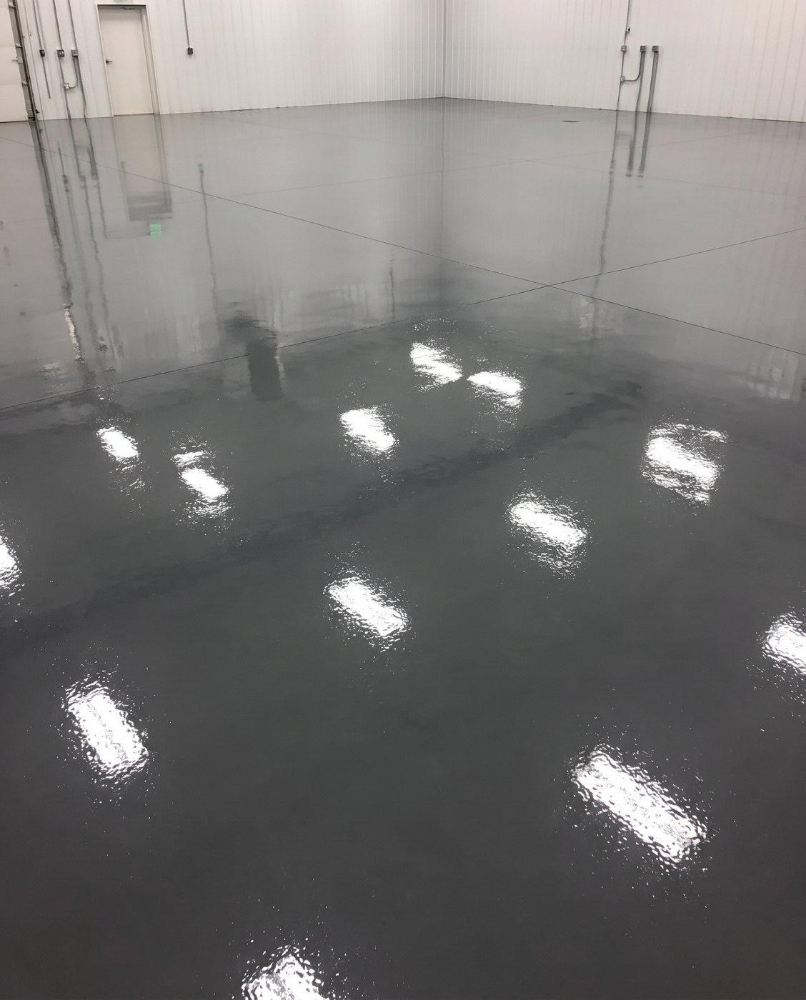 High-gloss gray coated floor in a finished space